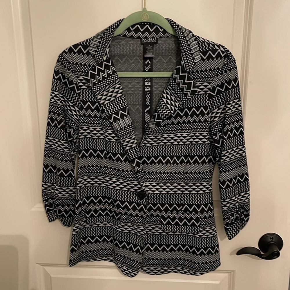 Aztec print woman’s size M jacket.